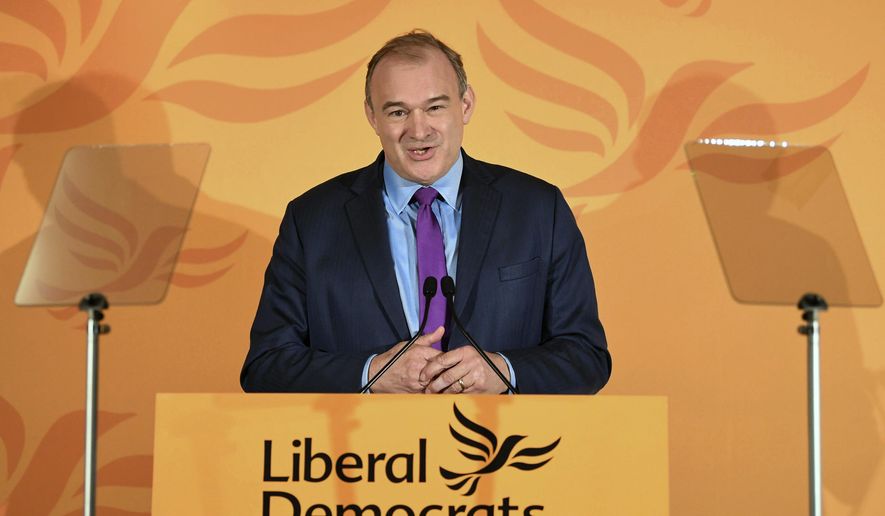 Ed Davey speaks after he was elected as the leader of the Liberal Democrats party, in London Thursday Aug. 27, 2020. The left-of-center Liberal Democrats' acting leader, Ed Davey, comfortably defeated challenger Layla Moran in a campaign that was mostly conducted online because of the coronavirus pandemic.(Stefan Rousseau/PA via AP)