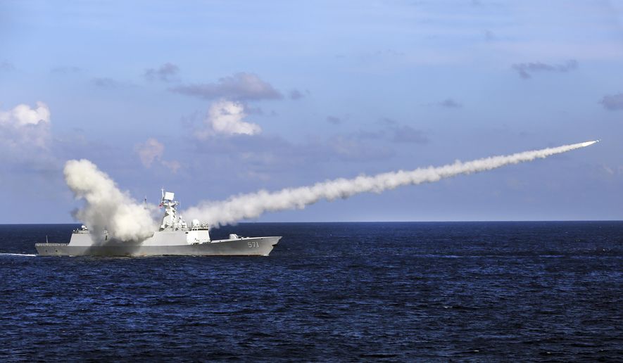 In this Friday, July 8, 2016, file photo released by Xinhua News Agency, Chinese missile frigate Yuncheng launches an anti-ship missile during a military exercise in the waters near south China&#39;s Hainan Island and Paracel Islands. China is holding another round of military drills in the South China Sea amid an uptick in such activity in the area highlighting growing tensions. (Zha Chunming/Xinhua via AP, File)