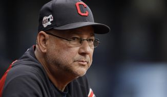 FILE - In this Sept. 1, 2019, file photo, Cleveland Indians manager Terry Francona watches during the first inning of the team&#x27;s baseball game against the Tampa Bay Rays in St. Petersburg, Fla. Cleveland&#x27;s three major professional sports franchises--the Browns, Cavaliers and Indians--are teaming up to fight social injustice. One day after the NBA postponed playoff games _ and other leagues followed suit--amid a player-led boycott to protest the shooting of a Black man by police in Wisconsin, the Cleveland teams announced their alliance to “develop a sustainable and direct strategy to address social injustice facing the city and all Northeast Ohio communities.” (AP Photo/Chris O&#x27;Meara, File)