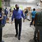 North Carolina Gov. Roy Cooper tours the Food Bank of Central &amp;amp; Eastern North Carolina food bank in Raleigh, N.C., Thursday, Aug. 27, 2020. (Ethan Hyman/The News &amp;amp; Observer via AP)