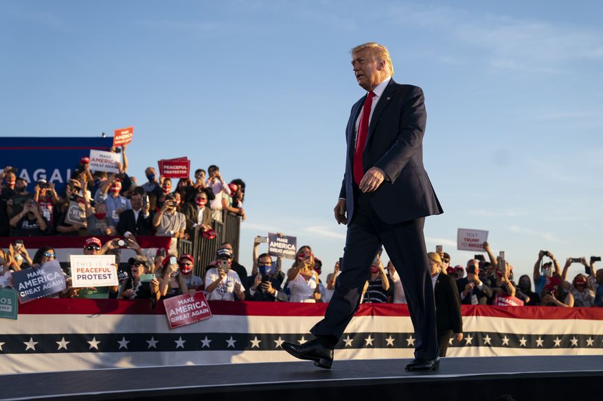 President Donald Trump arrives to speak to a campaign rally, Friday, Aug. 28, 2020, in Londonderry, N.H. (AP Photo/Evan Vucci)