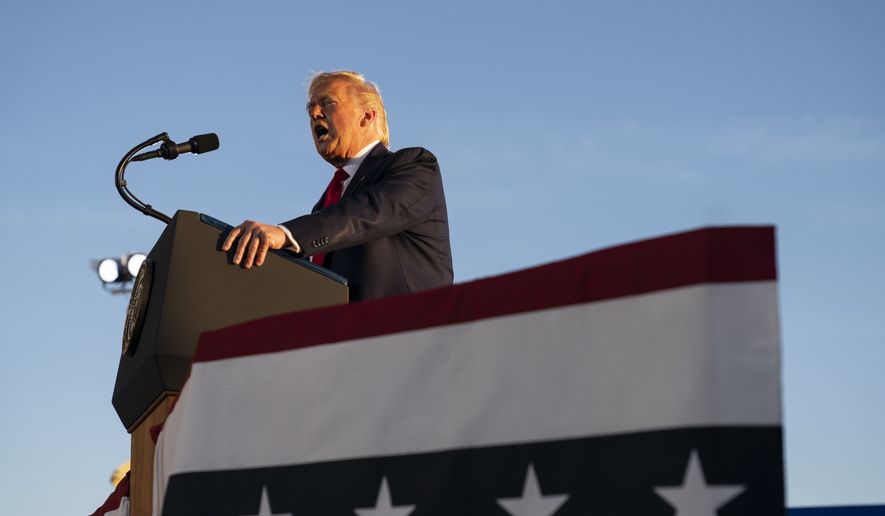 President Donald Trump speaks during a campaign rally, Friday, Aug. 28, 2020, in Londonderry, N.H. (AP Photo/Evan Vucci)