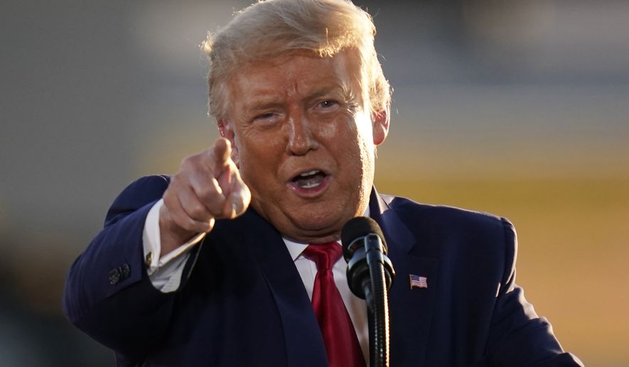 President Donald Trump speaks during a campaign rally at Manchester-Boston Regional Airport, Friday, Aug. 28, 2020, in Londonderry, N.H. (AP Photo/Charles Krupa)