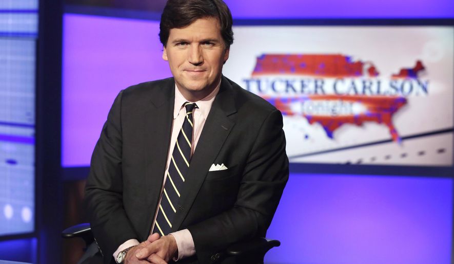 In this March 2, 2017, file photo Tucker Carlson, host of &amp;quot;Tucker Carlson Tonight,&amp;quot; poses for photos in a Fox News Channel studio, in New York. (AP Photo/Richard Drew, File)