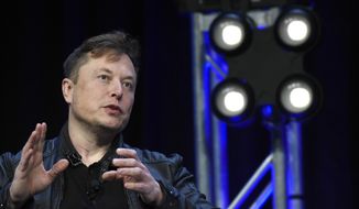 Tesla and SpaceX Chief Executive Officer Elon Musk speaks at the SATELLITE Conference and Exhibition in Washington, March 9, 2020. (AP Photo/Susan Walsh)  ** FILE **