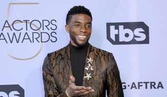 In this Jan. 27, 2019, file photo, Chadwick Boseman arrives at the 25th annual Screen Actors Guild Awards at the Shrine Auditorium &amp;amp; Expo Hall in Los Angeles. Boseman, who played Black icons Jackie Robinson and James Brown before finding fame as the regal Black Panther in the Marvel cinematic universe, has died of cancer. His representative says Boseman died Friday, Aug. 28, 2020, in Los Angeles after a four-year battle with colon cancer. He was 43.  (Photo by Willy Sanjuan/Invision/AP, File)