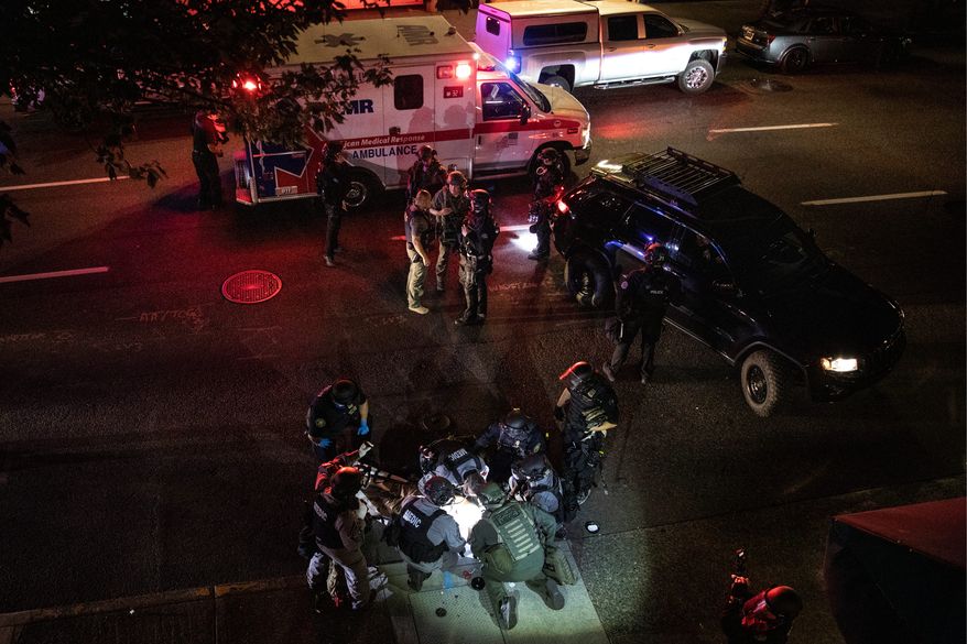 A man was fatally shot Saturday in Portland, Oregon, after counterdemonstrators downtown confronted a caravan of about 600 vehicles. Members of the right-wing Patriot Prayer group said the man was one of theirs, and they blamed Black Lives Matter protesters and Antifa for his death. (Associated Press)