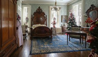 One of the five bedrooms in historic Magnolia Manor is seen in Cairo, Ill., on July 30, 2020.  (Byron Hetzler/The Southern Illinoisan via AP)