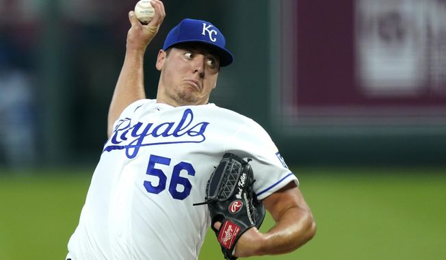 Kansas City Royals starting pitcher Brad Keller throws during the first inning of a baseball game against the Cleveland Indians, Monday, Aug. 31, 2020, in Kansas City, Mo. (AP Photo/Charlie Riedel)