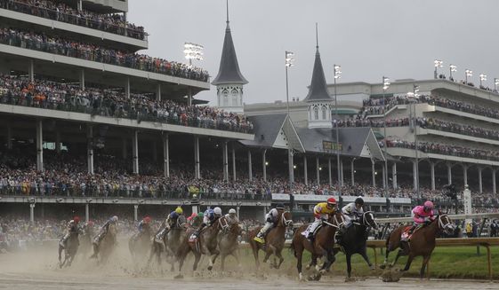 FILE - In this Saturday, May 4, 2019 file photo, Flavien Prat on Country House, third from right, races against Luis Saez on Maximum Security, right, during the 145th running of the Kentucky Derby horse race at Churchill Downs in Louisville, Ky. Maximum Security finished first but was disqualified. The fastest two minutes in sports will also be the quietest in Kentucky Derby history. Churchill Downs scraped plans earlier this month for 23,000 physically distanced, masked fans to attend Saturday&#39;s rescheduled Tripled Crown race due to the rise in coronavirus cases. It will be the first time spectators will not be allowed to attend the race.(AP Photo/Darron Cummings, File)