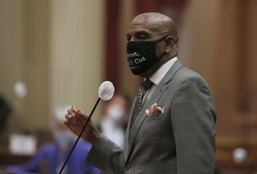 File - Sen. Steve Bradford, D-Gardena, urges lawmakers to approve a measure to place a proposed Constitutional amendment on the November ballot to overturn the ban on state affirmative action programs, at the Capitol in Sacramento, Calif., Wednesday, June 24, 2020. The California Senate advanced a bill Monday, Aug. 31, 2020, to ban evictions through January for people who can't pay their rent due to the coronavirus. (AP Photo/Rich Pedroncelli, File)