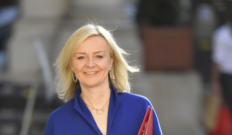 Britain&#39;s Secretary of State for International Trade Liz Truss arrives to attend a Cabinet meeting of senior government ministers at the Foreign and Commonwealth Office FCO in London, Tuesday, Sept. 1, 2020. (Toby Melville/Pool via AP)