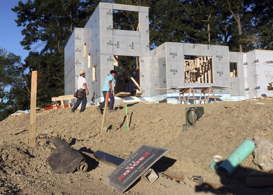 A new home is under construction on Wednesday, Aug. 19, 2020, in Pine Township, Pa. U.S. construction spending edged up a tiny 0.1% in July, breaking a string of losses due to disruptions caused by the coronavirus pandemic. (AP Photo/Ted Shaffrey)