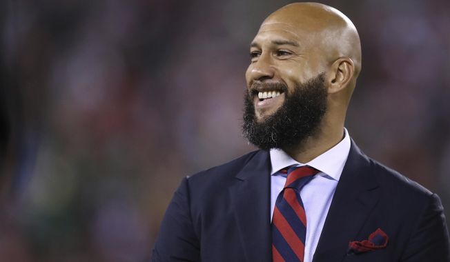 FILE - Former United States goalkeeper Tim Howard is honored before an international friendly soccer match between the United States and Mexico, Friday, Sept. 6, 2019, in East Rutherford, N.J. Former U.S. and Premier League goalkeeper Tim Howard is returning to NBC as an analyst when its coverage of England&#x27;s top division begins next week. The network announced on Tuesday, Sept. 1, 2020, that Howard will be a studio analyst.  (AP Photo/Steve Luciano, File)