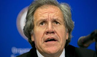 FILE - In this June 16, 2015 file photo, Organization of American States, OAS, Secretary-General Luis Almagro gives a news conference at the 45th OAS General Assembly, in Washington. (AP Photo/Jacquelyn Martin, File)