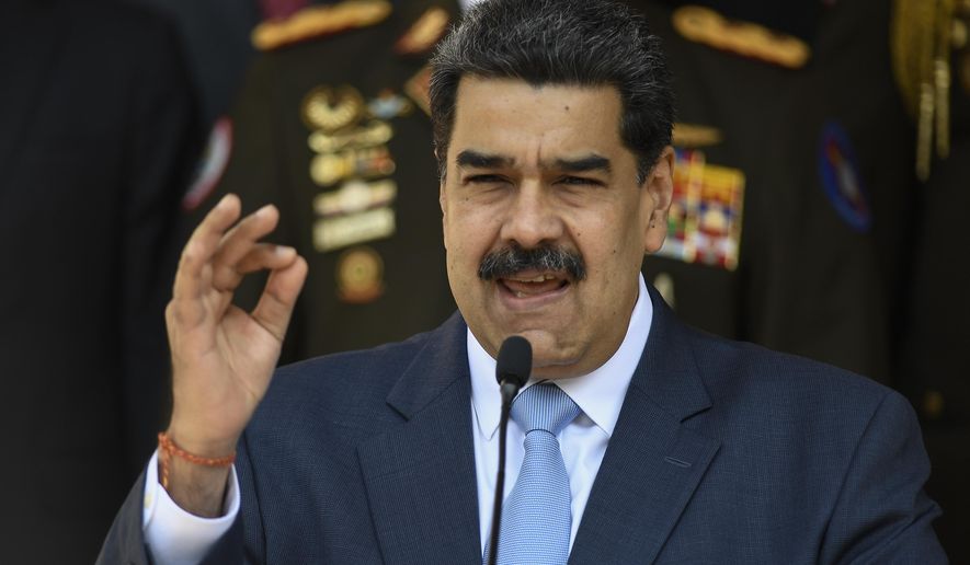 In this March 12, 2020, photo, Venezuelan President Nicolas Maduro speaks at the Miraflores presidential palace in Caracas, Venezuela. (AP Photo/Matias Delacroix) **FILE**