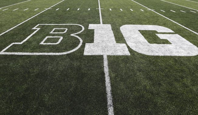 In this Aug. 31, 2019, file photo, the Big Ten logo is displayed on the field before an NCAA college football game between Iowa and Miami of Ohio in Iowa City, Iowa. Big Ten presidents voted 11-3 to postpone the football season until spring, bringing some clarity to a key question raised in a lawsuit brought by a group of Nebraska football players. The vote breakdown was revealed Monday, Aug. 31, 2020, in the Big Ten&#x27;s court filing in response to the lawsuit. (AP Photo/Charlie Neibergall, File)  **FILE**
