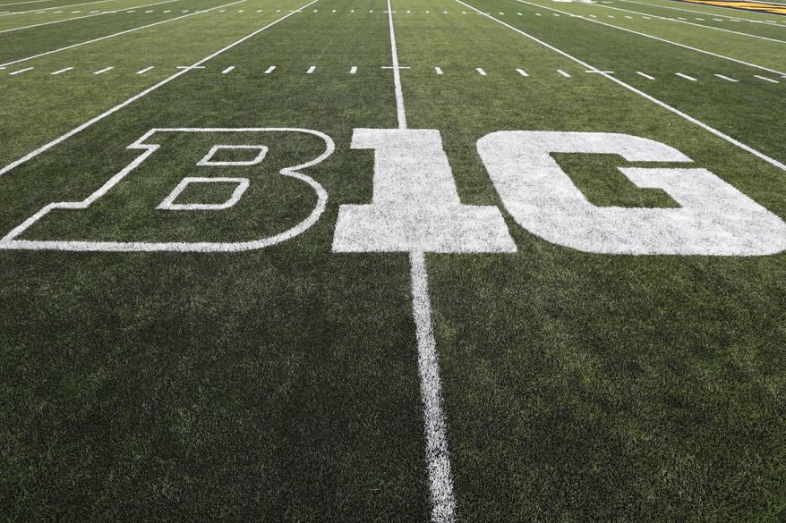 In this Aug. 31, 2019, file photo, the Big Ten logo is displayed on the field before an NCAA college football game between Iowa and Miami of Ohio in Iowa City, Iowa. Big Ten presidents voted 11-3 to postpone the football season until spring, bringing some clarity to a key question raised in a lawsuit brought by a group of Nebraska football players. The vote breakdown was revealed Monday, Aug. 31, 2020, in the Big Ten&#39;s court filing in response to the lawsuit. (AP Photo/Charlie Neibergall, File)  **FILE**