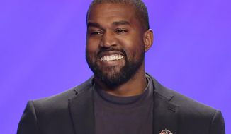 FILE - This Nov. 17, 2019, file photo shows Kanye West on stage during a service at Lakewood Church in Houston. A law firm with ties to prominent Democrats has filed a lawsuit attempting to keep West off presidential ballots in Virginia. Attorneys for Perkins Coie filed a lawsuit in Richmond on Tuesday, Sept. 1, 2020, on behalf of two people who say they were tricked into signing an “Elector Oath” backing West&#39;s candidacy. (AP Photo/Michael Wyke, File)