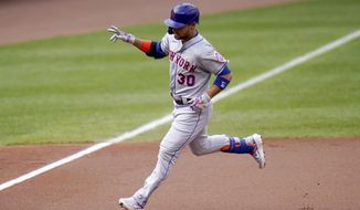 New York Mets&#39; Michael Conforto runs the bases after hitting a two-run home run off Baltimore Orioles starting pitcher John Means during the first inning of a baseball game, Wednesday, Sept. 2, 2020, in Baltimore. Mets designated hitter J.D. Davis scored on the home run. (AP Photo/Julio Cortez)