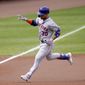 New York Mets&#x27; Michael Conforto runs the bases after hitting a two-run home run off Baltimore Orioles starting pitcher John Means during the first inning of a baseball game, Wednesday, Sept. 2, 2020, in Baltimore. Mets designated hitter J.D. Davis scored on the home run. (AP Photo/Julio Cortez)