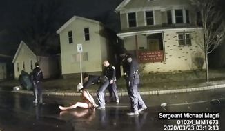 In this image taken from police body camera video provided by Roth and Roth LLP, a Rochester police officer puts a hood over the head of Daniel Prude, on March 23, 2020, in Rochester, N.Y. Video of Prude, a Black man who had run naked through the streets of the western New York city, died of asphyxiation after a group of police officers put a hood over his head, then pressed his face into the pavement for two minutes, according to video and records released Wednesday, Sept. 2, 2020, by the man&#39;s family. Prude died March 30 after he was taken off life support, seven days after the encounter with police in Rochester. (Rochester Police via Roth and Roth LLP via AP)