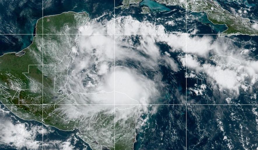 This satellite image released by the National Oceanic and Atmospheric Administration (NOAA) shows Tropical Storm Nana approaching Belize, Wednesday, Sept. 2, 2020. The storm is expected to strengthen throughout the day and make landfall in Belize as a hurricane late Wednesday or early Thursday. (NOAA via AP)