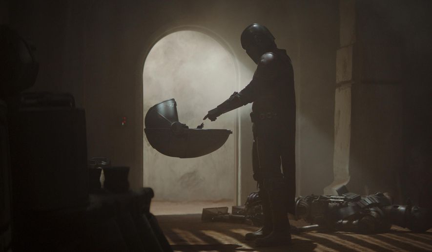 This image released by Disney Plus shows a scene from "The Mandalorian." An announcement on the Star Wars Twitter account Wednesday said new episodes would be available on Disney+ starting on Oct. 30. (Disney Plus via AP)