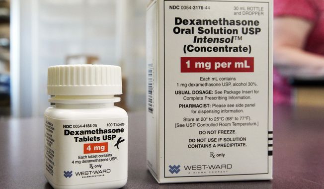 This Tuesday, June 16, 2020, photo shows a bottle and box for dexamethasone in a pharmacy in Omaha, Neb. New studies confirm that cheap steroid drugs improved survival for severely ill COVID-19 patients, cementing this as a standard of care and expanding options to more types than this one previously shown to help. (AP Photo/Nati Harnik) **FILE**