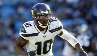 In this Dec. 15, 2019, file photo, Seattle Seahawks wide receiver Josh Gordon (10) sets up against the Carolina Panthers during the second half of an NFL football game in Charlotte, N.C. The Seahawks are bringing back wide receiver Josh Gordon on a one-year deal even as the talented pass catcher awaits reinstatement from the NFL after his latest suspension.   Gordon’s signing was confirmed on Twitter by his agent David Canter on Thursday, Sept. 3, 2020, just two days before the Seahawks must cut their roster to 53 players.  (AP Photo/Brian Blanco, File)  **FILE**