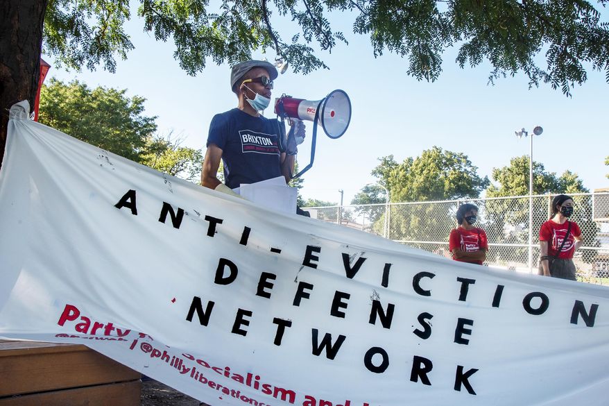 FILE — In this July 29, 2020, file photo, community organizer Asantewaa Nkrumah-Ture, with the Black Alliance for Peace and the Philadelphia Tenants Union, speaks as organizers from the Party for Socialism and Liberation hold a speak-out and teach-in, in Mifflin Square Park, in South Philadelphia. A Pennsylvania moratorium on eviction actions expired Monday, Aug. 31, clearing the way for nearly 1,800 evictions previously in process to resume in the city that sees close to 20,000 evictions annually. But an announcement late Tuesday by the U.S. Centers for Disease Control and Prevention could put a federal hold through the end of the year on many of those evictions starting Friday. (Tom Gralish/The Philadelphia Inquirer via AP, File)
