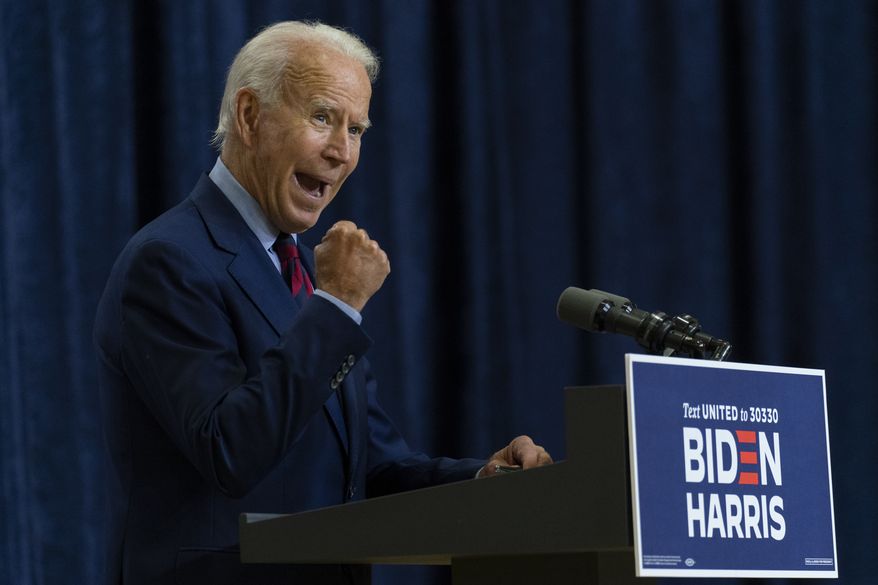Democratic presidential candidate former Vice President Joe Biden shakes his fist as he speaks in Wilmington, Del., Friday Sept. 4, 2020. (AP Photo/Carolyn Kaster)