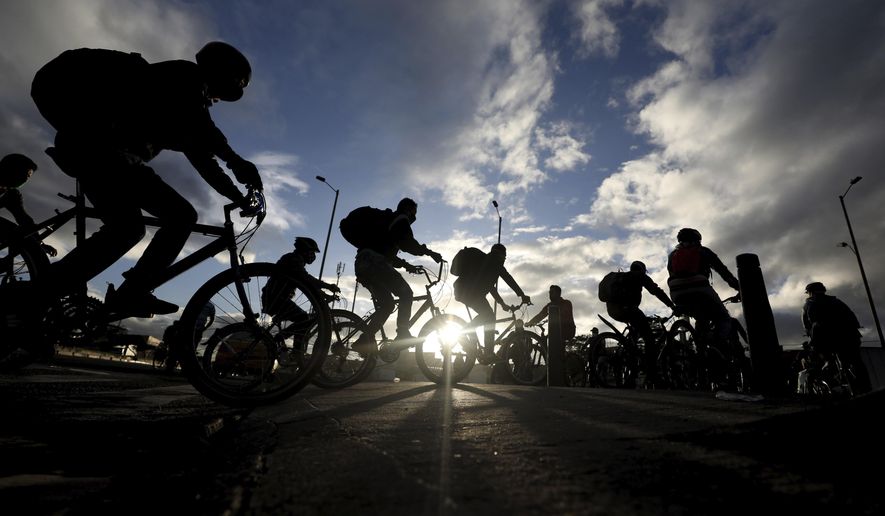 Bike shops have seen a major boom in demand for repair services as bicycling became a popular, socially distanced activity during the lockdown. (AP Photo/Fernando Vergara)