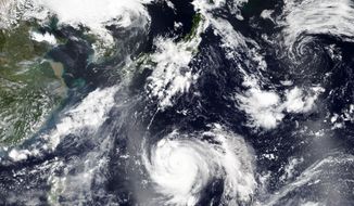 This Thursday, Sept. 3, 2020, satellite image released by NASA Worldview, Earth Observing System Data and Information System (EOSDIS) shows tropical storm Haishen, lower center, sweeping northward. Haishen could gain in ferocity before slamming into Japan&#39;s southern islands of Kyushu and Shikoku before reaching the Korean Peninsula on Monday. (NASA via AP)