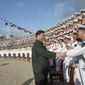 FILE - In this Dec. 17, 2019, file photo and provided by China&#39;s Xinhua News Agency, Chinese President Xi Jinping, center, meets with representatives of the aircraft carrier unit and the manufacturer at a naval port in Sanya, southern China&#39;s Hainan Province. Seventy-five years after Japan&#39;s surrender in World War II, and 30 years after its economic bubble popped, the emergence of a 21st century Asian power is shaking up the status quo. As Japan did, China is butting heads with the established Western powers, which increasingly see its growing economic and military prowess as a threat. (Li Gang/Xinhua News Agency via AP, File)
