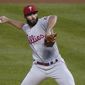 Philadelphia Phillies starting pitcher Jake Arrieta throws during the first inning of the team&#x27;s baseball game against the New York Mets, Friday, Sept. 4, 2020, in New York. (AP Photo/John Minchillo)