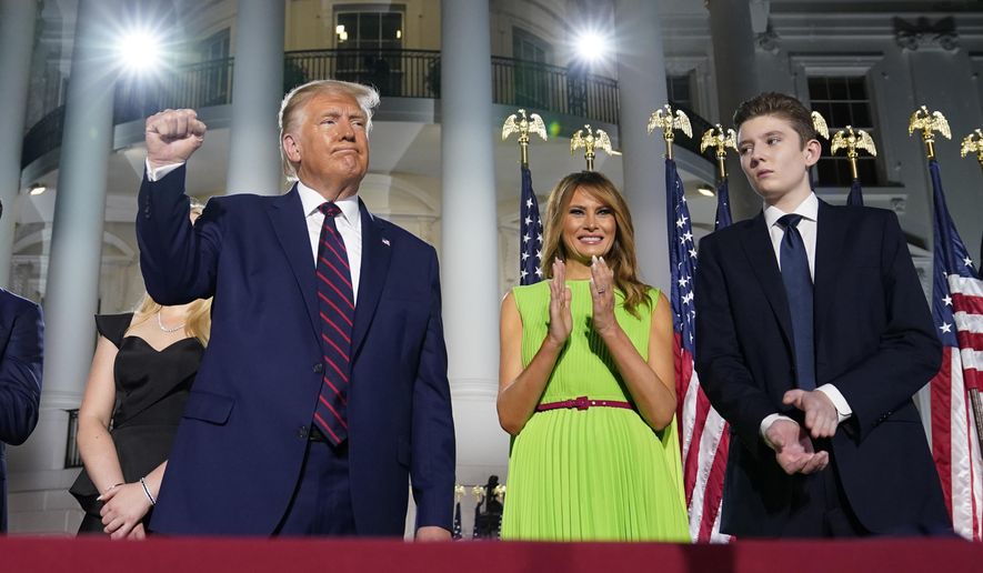President Donald Trump, first lady Melania Trump and Barron Trump stand on the South Lawn of the White House on the fourth day of the Republican National Convention, Thursday, Aug. 27, 2020, in Washington.  It&#x27;s called a “permission structure.” President Donald Trump&#x27;s campaign is trying to construct an emotional and psychological gateway to help disenchanted voters feel comfortable voting for the president again despite their reservations about him personally. (AP Photo/Evan Vucci)