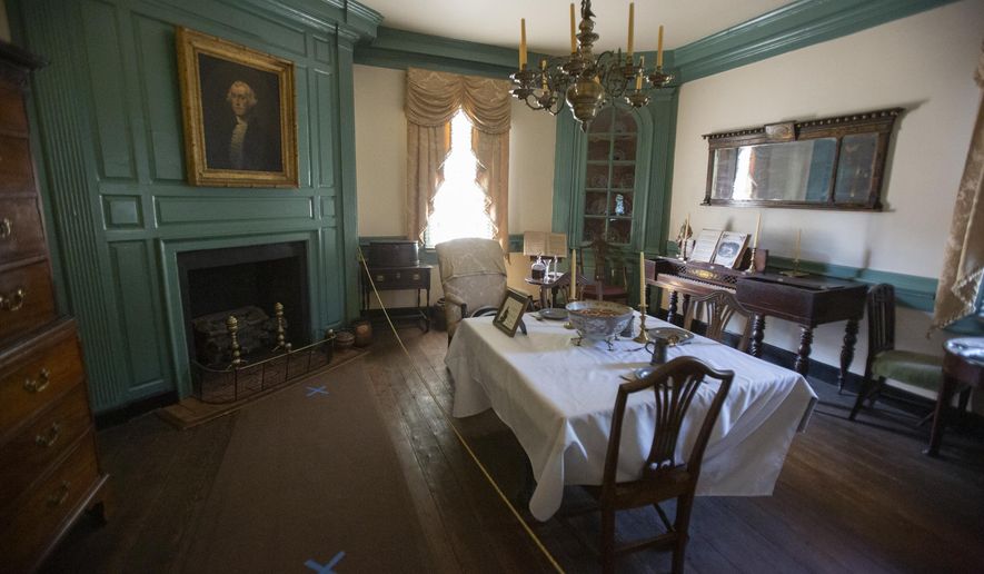 Daniel Hawkins, manager of the Rising Sun Tavern, inspects the property in Fredericksburg, Va. on Thursday, Aug. 27, 2020. (Mike Morones/The Free Lance-Star via AP)