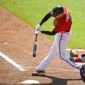 Atlanta Braves&#39; Freddie Freeman connects for a grand slam over left center field during the sixth inning of a baseball game against the Washington Nationals, Sunday, Sept. 6, 2020, in Atlanta. (AP Photo/John Amis)