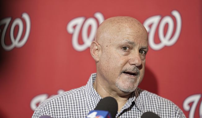 In this Jan. 11, 2020, file photo, Washington Nationals general manager Mike Rizzo talks with members of the media during the team&#x27;s &amp;quot;Winterfest&amp;quot; baseball fan festival in Washington. The  Nationals and Rizzo finalized a multiyear contract extension Saturday, Sept. 5, 2020. The 59-year-old Rizzo, who also holds the title of president of baseball operations, built the team that won the 2019 World Series championship. (AP Photo/Sait Serkan Gurbuz, File) **FILE**
