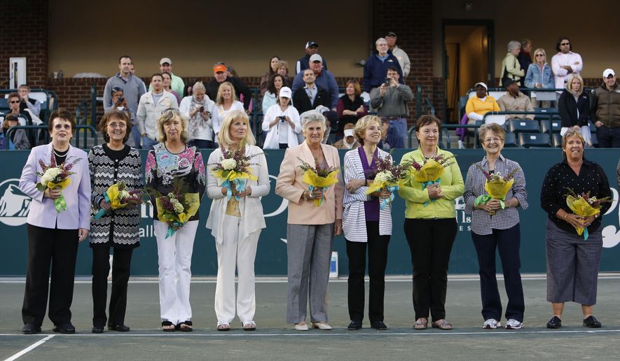 FILE - In this April 7, 2012, file photo, members of the original nine women, from left to right, Billie Jean King, Peaches Bartkowicz, Kristy Pigeon, Valerie Ziegenfuss, Judy Tegart Dalton, Julie Heldman, Kerry Melville Reid, Nancy Richey and Rosie Casals, who helped start the women&#39;s professional tennis tour are honored at the Family Circle Cup tennis tournament in Charleston, S.C. The nine signed a dollar contract 50 years ago, and it turned into millions for female tennis players. They were tired of being squeezed out of events by promoters and paid 10 times less than men. (AP Photo/Mic Smith, File)