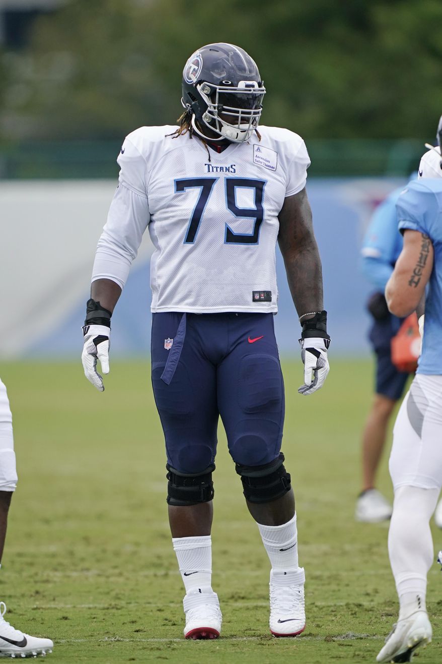 Tennessee Titans offensive tackle Isaiah Wilson gets set to run a drill during NFL football training camp Friday, Aug. 28, 2020, in Nashville, Tenn. (AP Photo/Mark Humphrey, Pool)