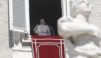 Pope Francis recites the Angelus noon prayer from his studio window overlooking St. Peter&#39;s Square, at the Vatican, Sunday, Sept. 6, 2020. (AP Photo/Gregorio Borgia)