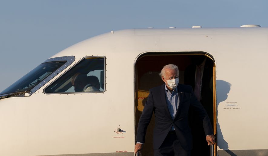 Democratic presidential candidate and former Vice President Joe Biden arrives on his plane at New Castle Airport in New Castle, Del., Monday, Sept. 7, 2020, as he returns from Harrisburg, Pa. (AP Photo/Carolyn Kaster)