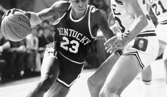 FILE - University of Kentucky&#39;s Dwight Anderson drives past Duke University&#39;s Jim Suddath during the first half of an NCAA college basketball game in Springfield, Mass., Nov. 17, 1979. Dwight Anderson, who earned the nickname “The Blur&amp;quot; because of his speed on the court playing basketball at Kentucky and Southern California, has died. He was 59. Anderson died last Saturday, Sept. 5, 2020, in his hometown of Dayton, Ohio, according to USC. The cause was not immediately known.(AP Photo/Paul Benoit, File)