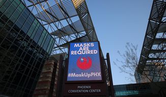 This Sept. 3, 2020 photo shows the Phoenix Convention Center in Phoenix.  The facility has offered some relief to people living on the street during record-breaking temperatures and the coronavirus pandemic. (AP Photo/Cheyanne Mumphrey)