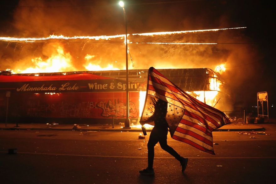 A new analysis from The Daily Beast reveals that multiple progressive groups are now scoping out the possibility of violence and a "Doomsday scenario" following the presidential election. (Associated Press)
