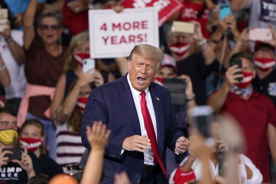 President Donald Trump reacts to supporters as he arrives to speak at a campaign rally Tuesday, Sept. 8, 2020, in Winston-Salem, N.C. (AP Photo/Chris Carlson)