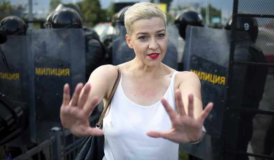 In this Sunday, Aug. 30, 2020, file photo, Maria Kolesnikova, one of Belarus&#39; opposition leaders, gestures during a rally in Minsk, Belarus. Maria Kolesnikova, a leading opposition activist and several other members of an opposition council in Belarus went missing Monday, Sept. 7, 2020, and their colleagues feared they were detained as part of the authorities&#39; efforts to squelch nearly a month of protests against the reelection of the country&#39;s authoritarian leader. (Tut.By via AP, File)
