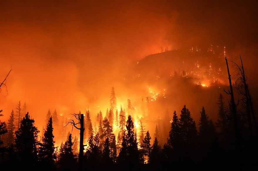 The Creek Fire burns in the Sierra National Forest, Sunday, Sept. 6, 2020, near Big Creek, Calif. (AP Photo/Marcio Jose Sanchez)